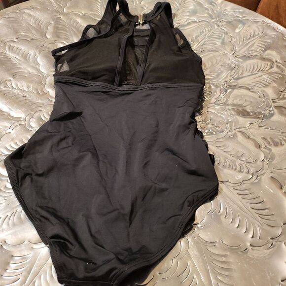 Beautiful  brand new one piece bathing suit sz.small black in color,very slimmin - Picture 4 of 5